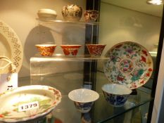 VARIOUS 18TH CENTURY AND LATER CHINESE TEA BOWLS, PROVINCIAL WARE COVERED BOXES, SAUCERS ETC.