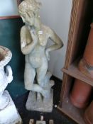 A LARGE ANTIQUE WEATHERED COMPOSITE STONE FIGURE OF A MAIDEN. H.138cms.