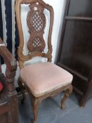 A PAIR OF ITALIAN HIGH BACK SIDE CHAIRS WITH CARVED DECORATION.