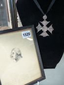 A VICTORIAN SILVER COLOURED METAL COMMEMORATIVE CROSS AND A WASH DRAWING BUST PORTRAIT OF ADMIRAL