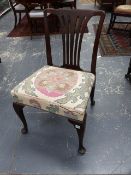 A GEORGIAN MAHOGANY DESK CHAIR WITH PIERCED BACK SPLAT AND CABRIOLE LEGS AND PAD FEET.