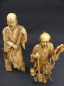 TWO JAPANESE CARVED IVORY STANDING FIGURES, A GARDENER AND A PAINTER. HEIGHT OF LARGEST 16CM