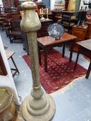 A PIERCED BRASS MOORISH DESIGN FLOOR STANDING LAMP BASE. OVER ALL CALLIGRAPHIC AND FIGURAL