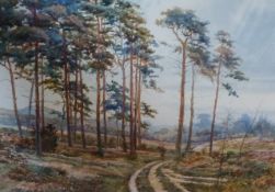 Tom Howe (early 20th Century), Faggot gatherer near Scots pines in a landscape, signed and dated '