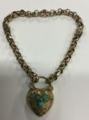 A Victorian precious gold coloured bracelet with turquoise set padlock clasp, approximately 12.