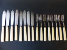 A set of eight silver fish knives and forks. Sheffield 1928.