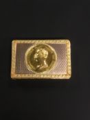 A 19th Century precious gold coloured snuff box bearing a bust of Fredrich Wilhelm III Koenig Von