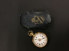 An 18k gold coloured back and front fob watch. The interior back plate inscribed Percy W Goad & Co.,