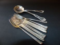 A set of twelve American silver coloured dessert forks and two sauce ladles. Made by Starr &