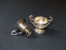 A George III silver baluster Christening cup, London 1815, 4ozs, a miniature silver two handled cup,