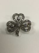A Victorian diamond set clover leaf brooch set with rose cut diamonds and old cut diamonds