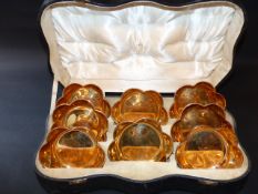 A cased set of eight silver gilded hexagonal shaped finger bowls/bon bon dishes. Sheffield 1933.