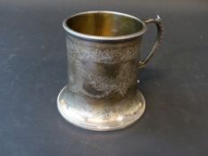 A Victorian silver cylindrical christening cup with flared base, London 1870, maker possibly Stephen