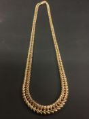 A 9ct gold herring bone link necklace, makers initials JC & S. Approximately 40grams