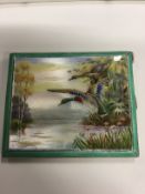 A silver and enamel cigarette case, the front decorated with ducks returning to their nesting