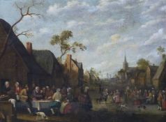 Circle of Joost Cornelisz Droochsloot (1586-1666) Dutch, Revellers and dogs in a street, oil on