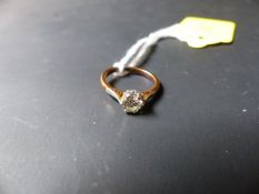 An 18ct gold and platinum single stone diamond ring 0.50 approximately.