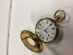 A gentleman's 18ct gold demi-hunter pocket watch with topwind action. Engraved back, bearing dated