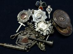 A SELECTION OF SILVER AND WHITE METAL FOBS, A SILVER ALBERT, ETC