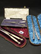 THREE PAIRS OF BOXED GLOVE STRETCHERS (TWO OF HALLMARKED SILVER)