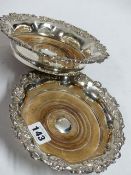 A PAIR OF SHEFFIELD PLATED WINE COASTERS. 17CM DIAMETER