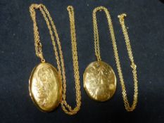 TWO 9CT GOLD LARGE LOCKETS ON CHIANS