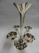 A SILVER TABLE EPERGNE WITH FOUR SMALLER DETACHABLE SPILL VASES. DATED LONDON 1910. 35CM HIGH