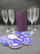 A GIOBAGNARA WINE COOLER TOGETHER WITH DESIGNER CHAMPAGNE FLUTES AND RABNAS COASTERS