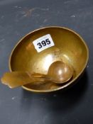 AN ARTS AND CRAFTS FORMED COPPER BOWL AND A SIMILAR CADDY SPOON