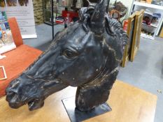 A CAST STONE HORSE HEAD AFTER THE ANTIQUE