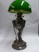 A PLATED OIL LAMP WITH CLASSICAL OVERTONES