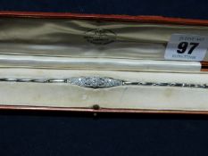 AN 18CT WHITE GOLD DIAMOND SET COCKTAIL BRACELET IN FITTED CASE. 17.5CM LONG