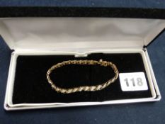 A DIAMOND TENNIS BRACELET