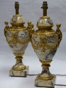 A PAIR OF LARGE MARBLE AND ORMOLU CASTELETO MOUNTED AS LAMPS