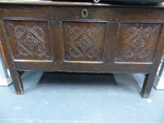 AN EARLY 18THC. CARVED PANEL OAK COFFER