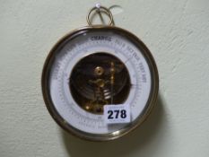 A WALL BAROMETER