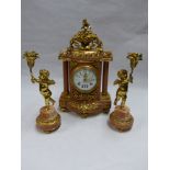 A FRENCH GILT BRONZE AND MARBLE CLOCK GARNITURE