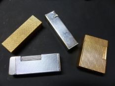 A DUNHILL SILVER PLATED CIGARETTE LIGHTER STAMPED CARTIER LICENCE TOGETHER WITH A DUNHILL LIGHTER, A