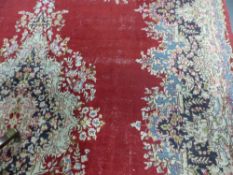 RED GROUND PERSIAN CARPET