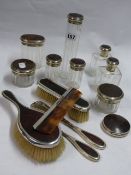 EIGHT SILVER MOUNTED GLASS TOILET JARS WITH TORTOISESHELL LIDS, A POWDER COMPACT, BUTTON HOOK, COMB,