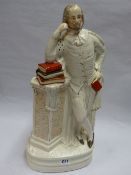 AN IMPRESSIVE VICTORIAN LARGE SCALE STAFFORDSHIRE FIGURE DEPICTING SHAKESPEARE