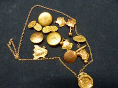 A QUANTITY OF 9CT GOLD. APPROXIMATELY 27 GRAMS