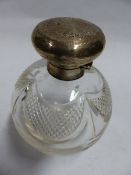 A SILVER MOUNTED CUT GLASS GLOBULAR SCENT BOTTLE. BIRMINGHAM 1906