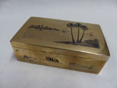 A MIDDLE EASTERN SILVER COLOURED CIGARETTE BOX WITH NIELLO SCENES OF FELUCCAS ON THE NILE. 15 X 8CM