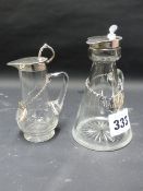 TWO SILVER MOUNTED GLASS WHISKEY TOTS WITH LABELS
