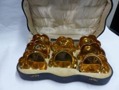 A SET OF EIGHT SILVER GILT HEXAGONAL SHAPED FINGER BOWLS. SHEFFIELD 1933. 33 OZS