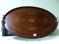 AN OVAL INLAID MAHOGANY TRAY WITH BRASS HANDLES