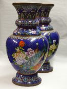 A PAIR OF LARGE DECORATIVE CLOISONNE VASES WITH STYLIZED BIRDS AND FLOWERS ON BLUE GROUND