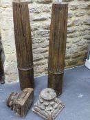 A PAIR OF HARD WOOD COLUMNS AND CAPITALS