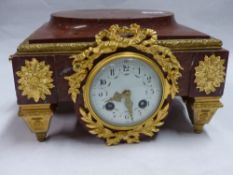 A VICTORIAN MARBLE AND GILT BRONZE MOUNTED CLOCK FORMING A SOCLE PREVIOUSLY SPORTING A BRONZE